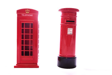 Classic British red phone booth and post-box on isolated white