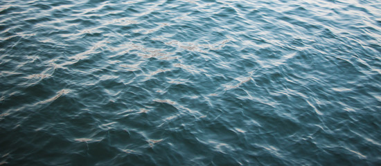 blue wave sea surface with light reflection