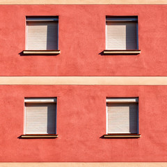 Facade of a building with four closed windows