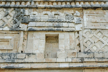 
Mayan reliefs in the quadrangle of the nuns in the archaeological Uxmal enclosure in Yucatan, Mexico.