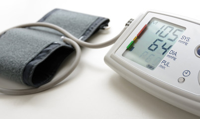 Digital blood pressure mesuring device on white