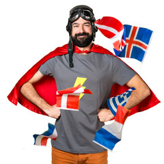 Fototapeta premium Happy superhero with a lot of flags