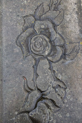 Stone slab engraved with a rose