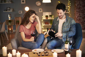 Couple having evening entertainment together