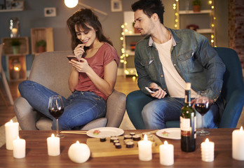 Young man spy on girlfriends cell phone