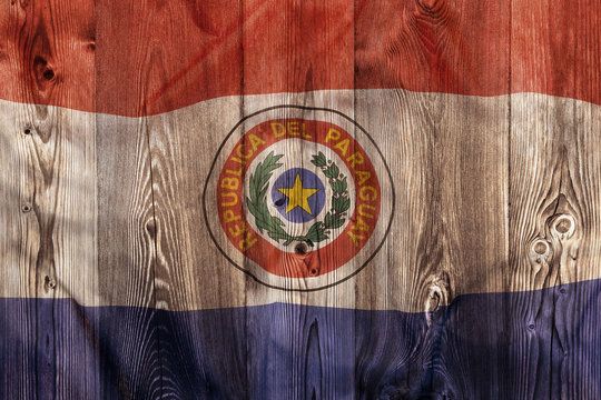 National flag of Paraguay, wooden background
