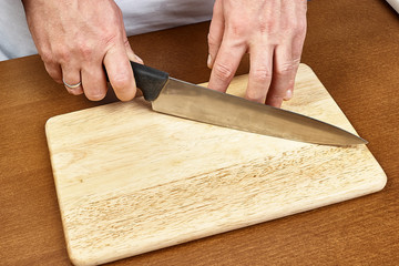 Knife in hand chef