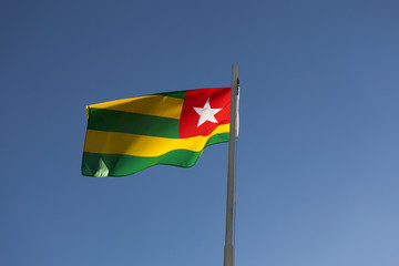 National flag of Togo on a flagpole