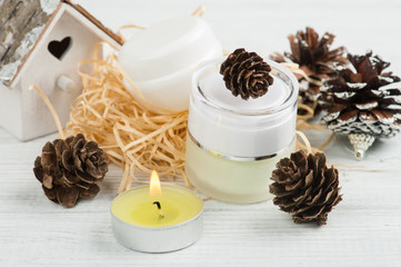 Beauty products and pine cones