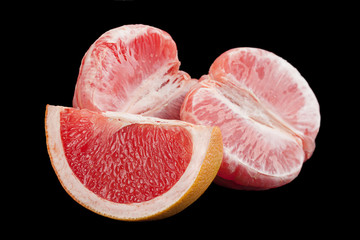 Orange grapefruit on black background