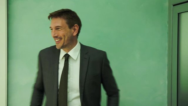 Businessman text messaging during break