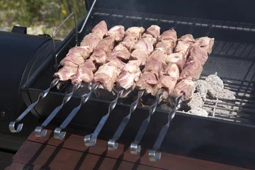 Printed kitchen splashbacks Grill / Barbecue Grilling shashlik on a barbeque grill outdoor