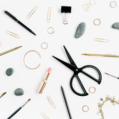 Home office table with scissors, clips and female accessories. Flat lay, top view. Fashion background.