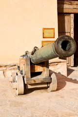 in oman muscat the old castle and cannon near the wall