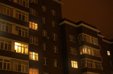 facade of a multistory house at night