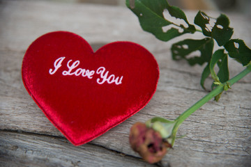 Love you on red heart with rose
