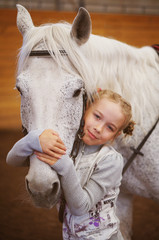 The child and the horse.