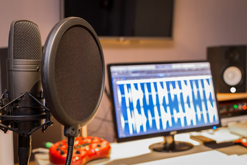 condenser microphone in digital recording, editing, broadcasting, podcast or online radio studio