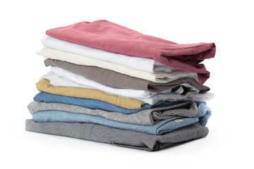 Stack of clothes on white background, closeup