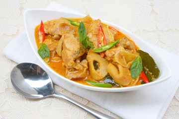 spicy bamboo shoot with chicken in coconut cream and red curry
