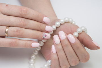 Beautiful woman's hands. Natural nails and manicure. Spa procedure.