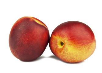 Two ripe peach niktarina isolation on a white background