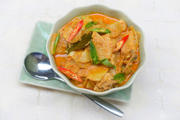 spicy bamboo shoot with chicken in coconut cream and red curry 
