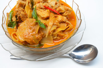 spicy bamboo shoot with chicken in coconut cream and red curry 

