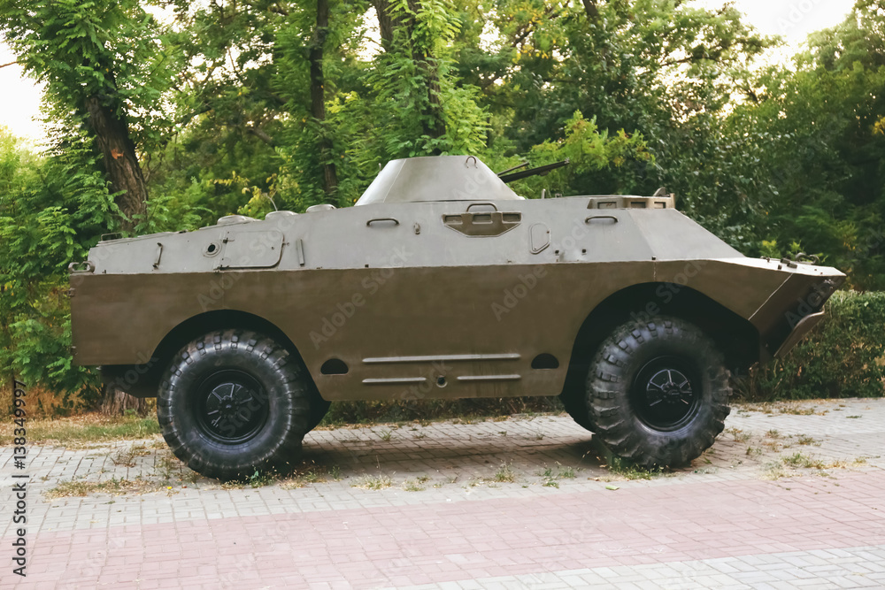 Wall mural armored troop carrier monument in park