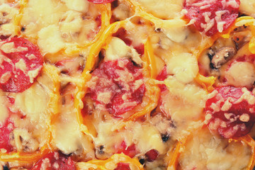 Close up view of tasty pizza with pepperoni, cheese, mushrooms and salad pepper