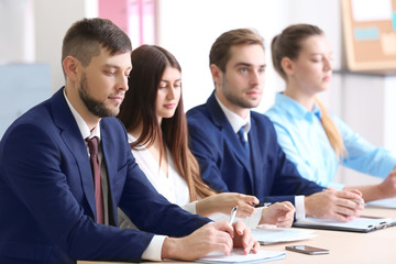 Group of interviewers during colloquy in office