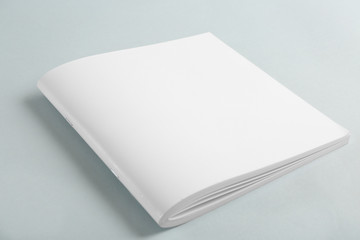 Blank brochure on grey background