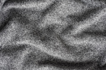 Crumpled Background Of Grey Soft Fleece Fabric Texture.