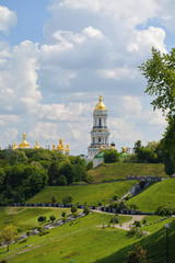 Fototapeta na wymiar Kyiv. Ukraine. The Park of Eternal Glory to the Soldiers of the World War II. Kyiv Pechersk Lavra (monastery) is in the background.