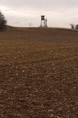 Fototapeta premium farmland landscape and a hide