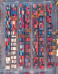 container ship in import export and business logistic.By crane ,Trade Port , Shipping.cargo to harbor.Aerial view.Water transport.International.Shell Marine.Top view.