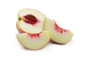 Peaches. Ripe fresh peaches with half and slice isolated on white background.