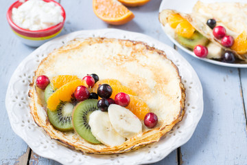 Creps with fruits and cream 