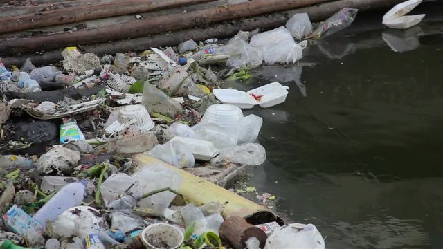   View of water pollution in Klong Prem river parallel with Rama 5 road  in Bangkok, Thailand.