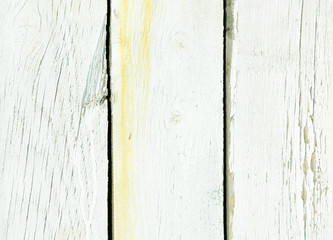 Old shabby background of natural wood white. The vertical boards are painted. Retro and vintage.