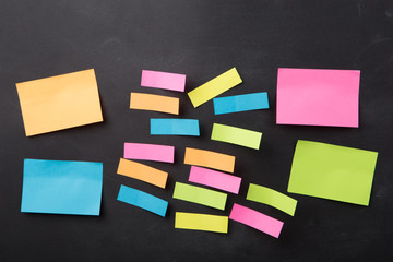 sticky note on the blank blackboard
