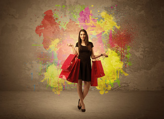 Girl with shopping bags and paint splatter