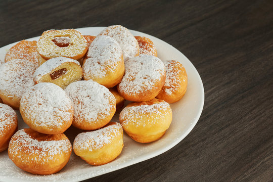 Traditional donuts with liqueur and sugar
