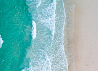 Aerial view. Top view.amazing nature background.The color of the water and beautifully bright.Azure beach with rocky mountains and clear water of Thailand ocean at sunny day.