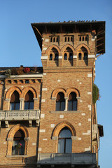 Fototapeta na wymiar antique brick building with a little tower