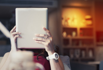 Asian girl  looking the tablet