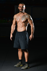 Fototapeta na wymiar Portrait Of A Physically Fit Muscular Man
