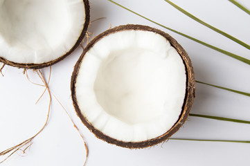 Halved coconut on a wooden table
