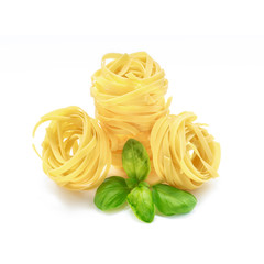 Italian pasta with basil on white background