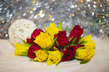 yellow and red roses buds
